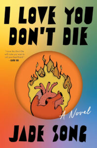 The cover of I Love You Don't Die featuring a cartoon heart on fire with a rainbow background
