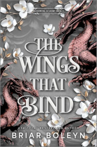 The cover of The Wings That Bind by Briar Boleyn featuring a gray background, white flowers, and two pink dragons