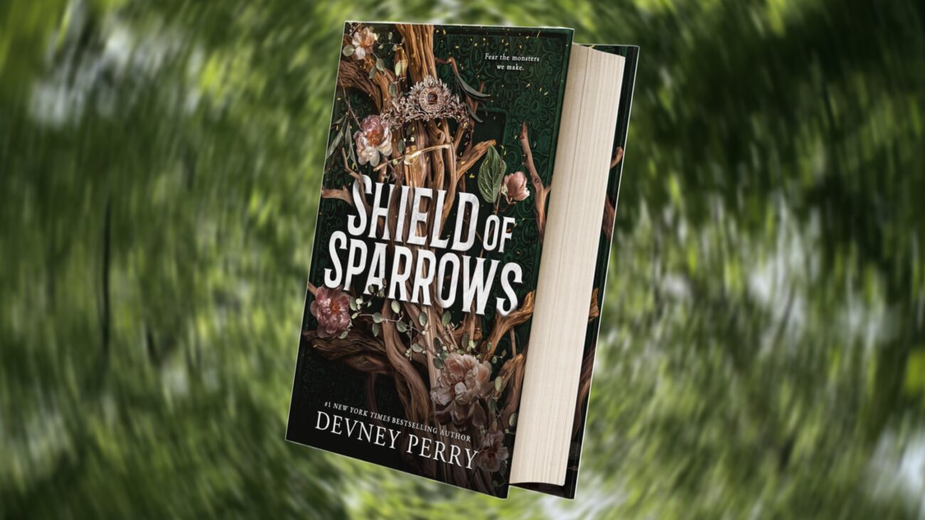 A cutout of Shield of Sparrows against a blurred background of trees